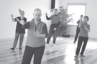 group practicing tai chi